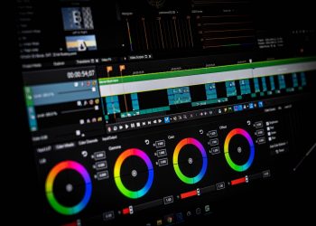 Adobe Premiere Pro video editing software interface showing timeline and transitions